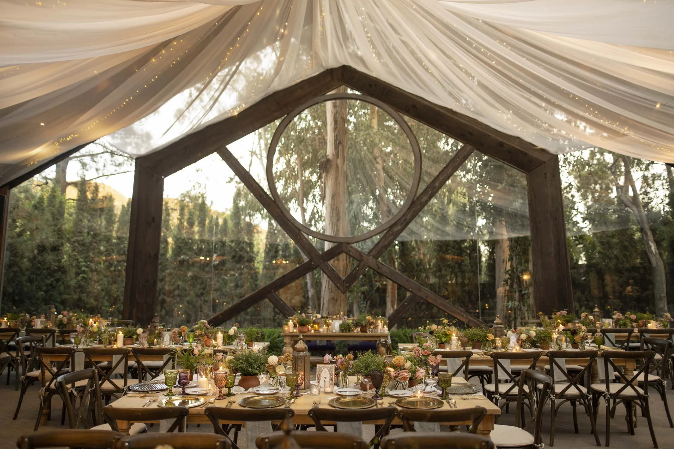 Enchanted forest wedding reception at dusk at Calamigos Ranch